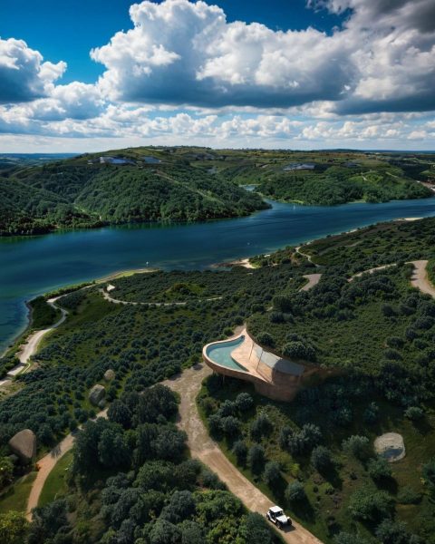 Scenic Aerial View of Turquoise Lake, Rolling Hills and Modern Architecture in Nature - QVVV Master Plan